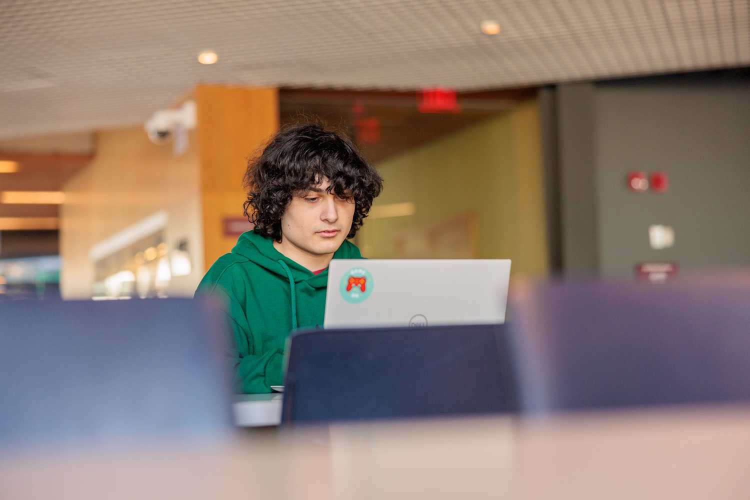 Jason coding in the BSU science building lounge